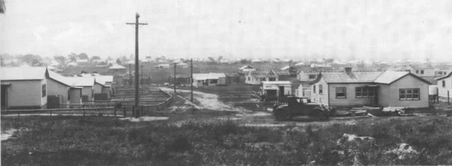 A.P.M. houses under construction, looking down Booth Street, 1947