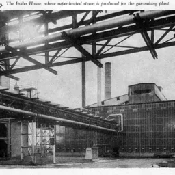 The conveyor gallery system for carrying briquettes and raw brown coal runs three-quarters of a mile across country to the plant.