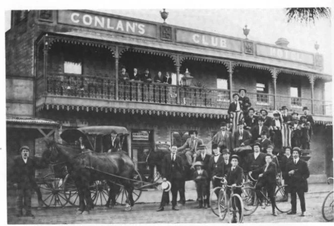 Group outside Conlan’s Hotel, Commercial Road in the early 1900s. A victorious football team perhaps?