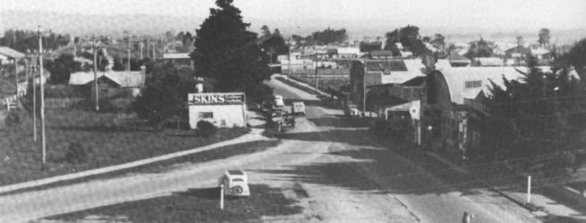 Princes Highway, looking west from the railway crossing and near Church Street, 1940s. Gude’s, Trembath’s and Henderson’s garages on the right